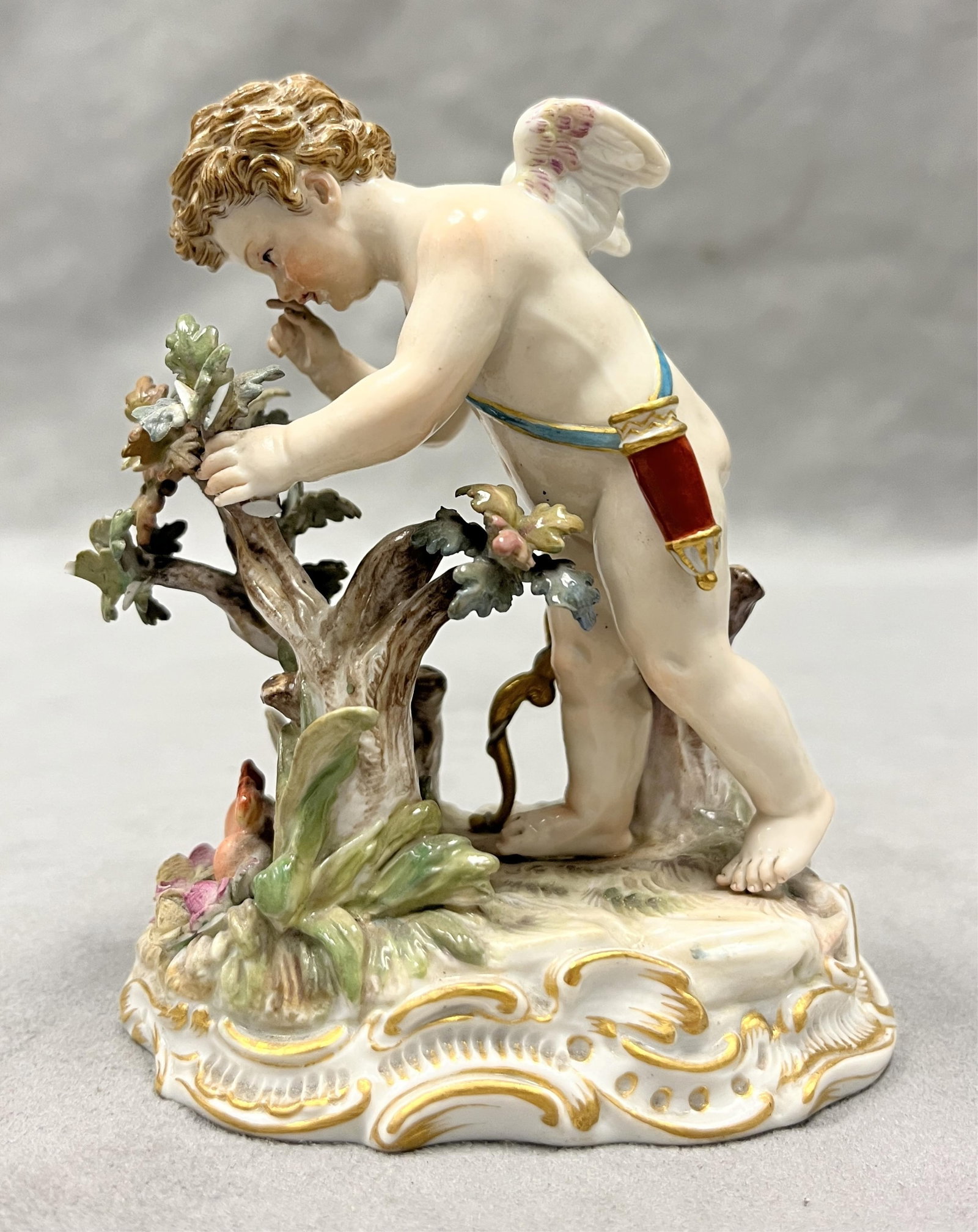 THREE MEISSEN PORCELAIN FIGURES OF CUPID ENGAGED IN VARIOUS ACTIVITIES 19th century - Each, H: 4 5/8 (1 of 7)