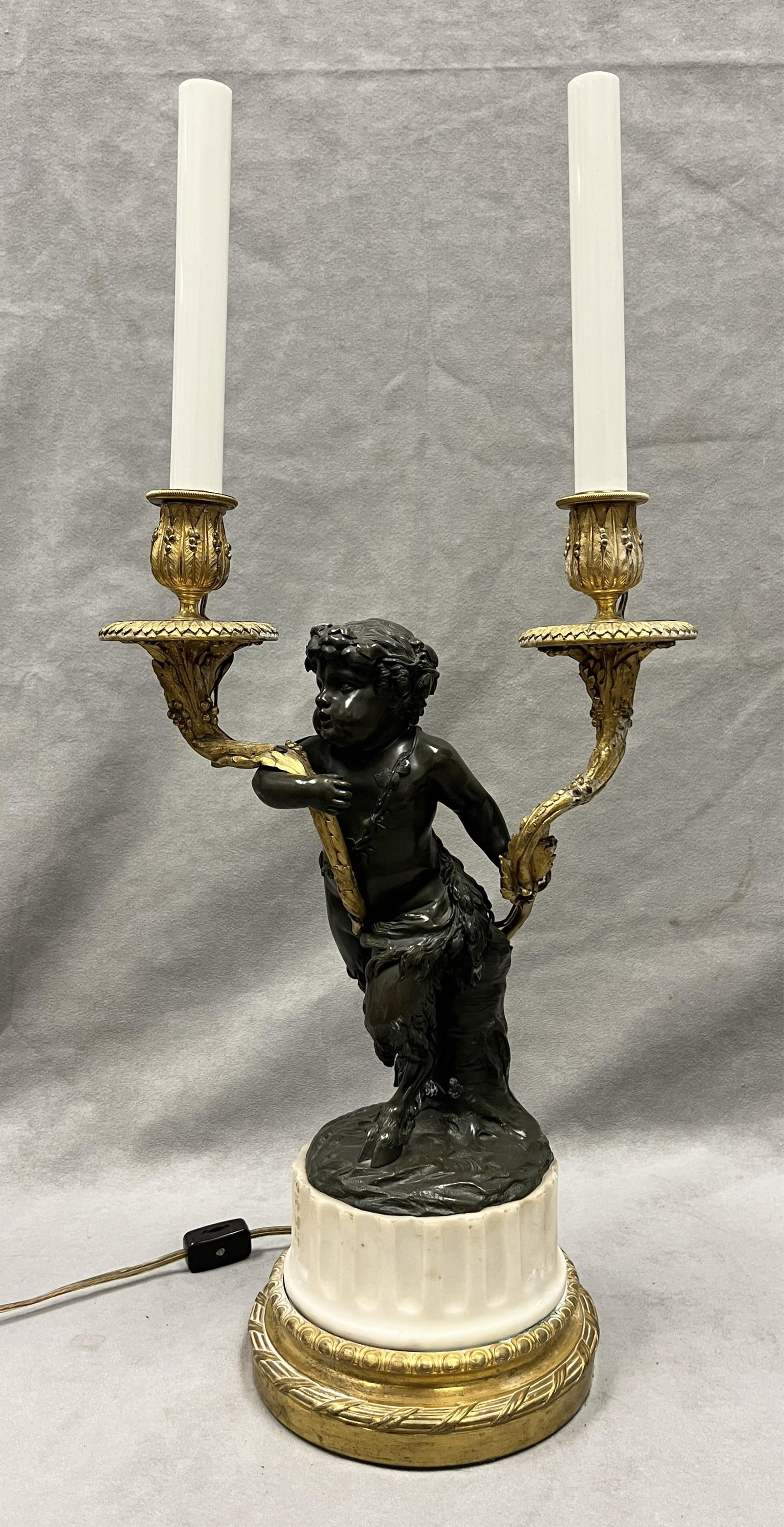 FRENCH BRONZE AND ORMOLU SATYR-FORM TWO-LIGHT TABLE LAMP 19th century - H: 15 5/8 inches.. (1 of 10)