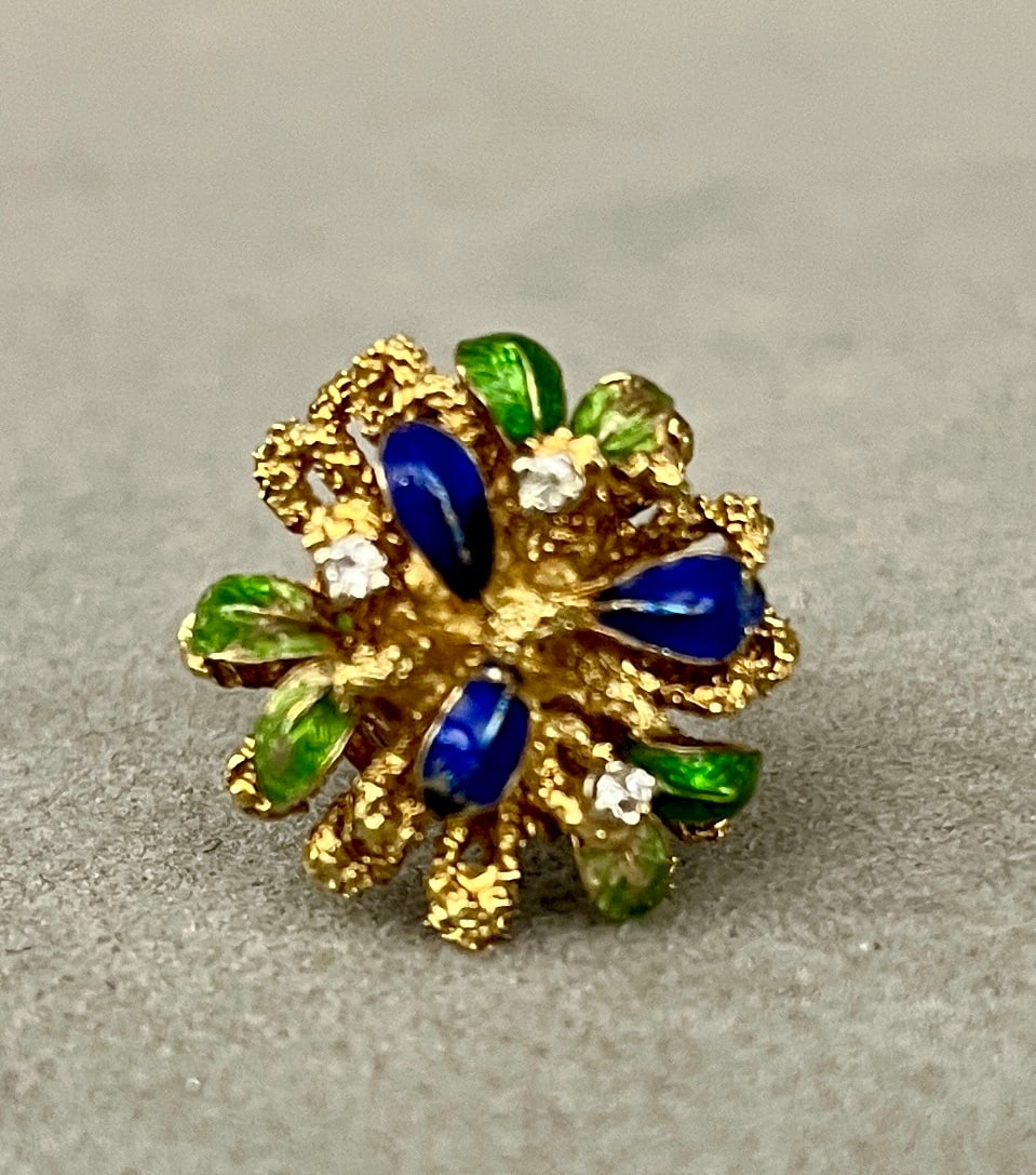 1960s 14K YELLOW GOLD, DIAMOND AND COBALT AND EMERALD COLOR ENAMEL FLORAL DESIGN DOME RING Cluster: 1960s 14K YELLOW GOLD, DIAMOND AND COBALT AND EMERALD COLOR ENAMEL FLORAL DESIGN DOME RING Cluster of stylized gold petals with six green and three cobalt enamel leaves scattered with three round diam