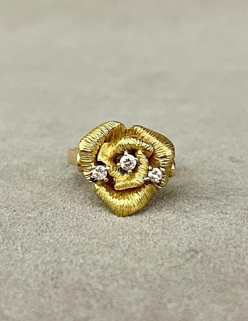 18K YELLOW GOLD AND DIAMOND ROSE BLOSSOM DESIGN RING Textured rose set with three brilliant-cut (1 of 2)