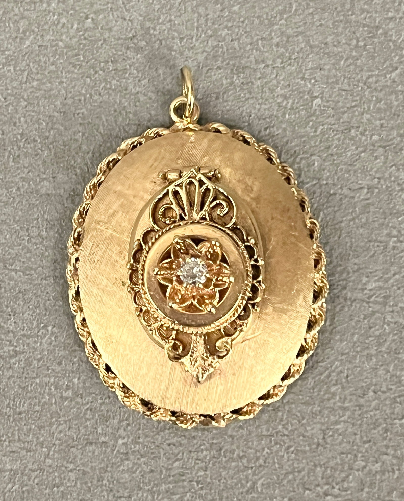 14K TEXTURED YELLOW GOLD AND DIAMOND OVAL MEDALLION CONVERTED FROM LOCKET Cartouche and flowerhead (1 of 2)