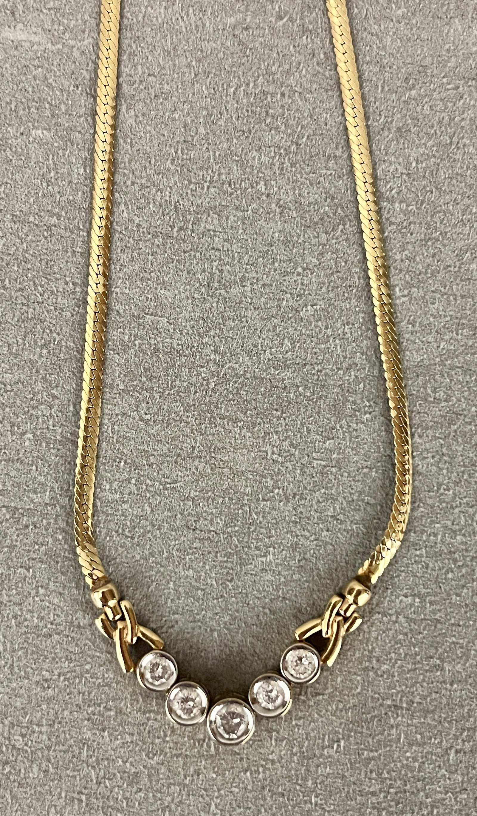 14K BRIGHT-POLISHED YELLOW GOLD AND DIAMOND CHOKER Flat flexible strap chain centers throat (1 of 3)