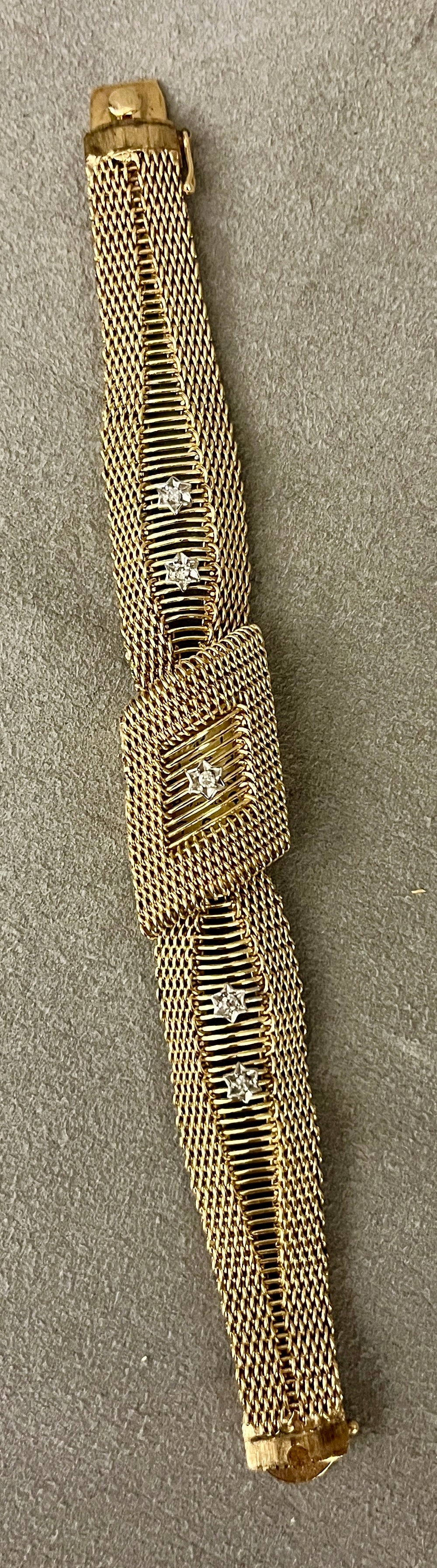 1960s-1970s 14K YELLOW GOLD AND DIAMOND BRACELET WATCH BY I.B.C. Shaped openwork mesh flexible (1 of 3)