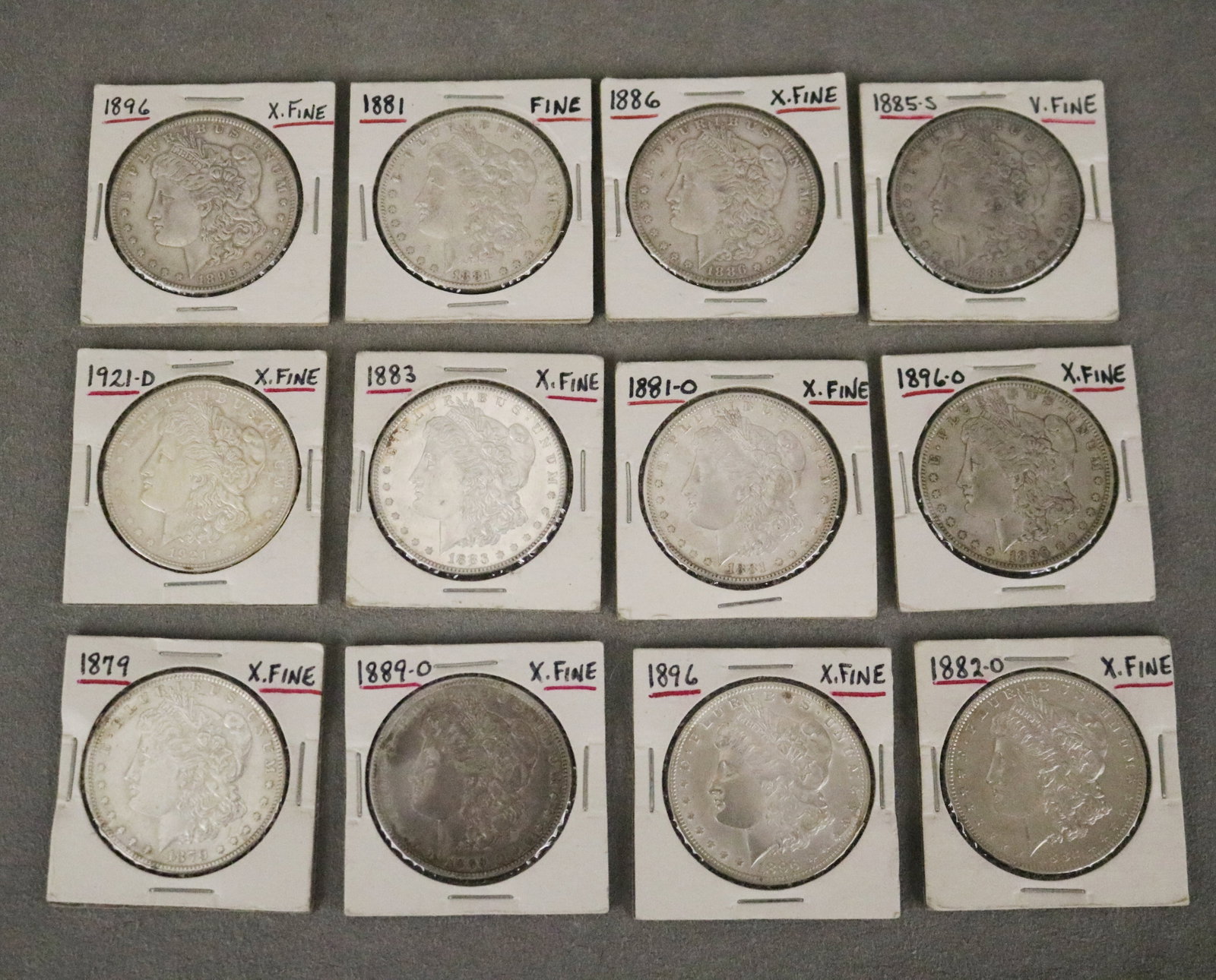 71 U.S. MORGAN SILVER DOLLARS Assorted 19th and 20th century dates and mint marks; informally (1 of 7)