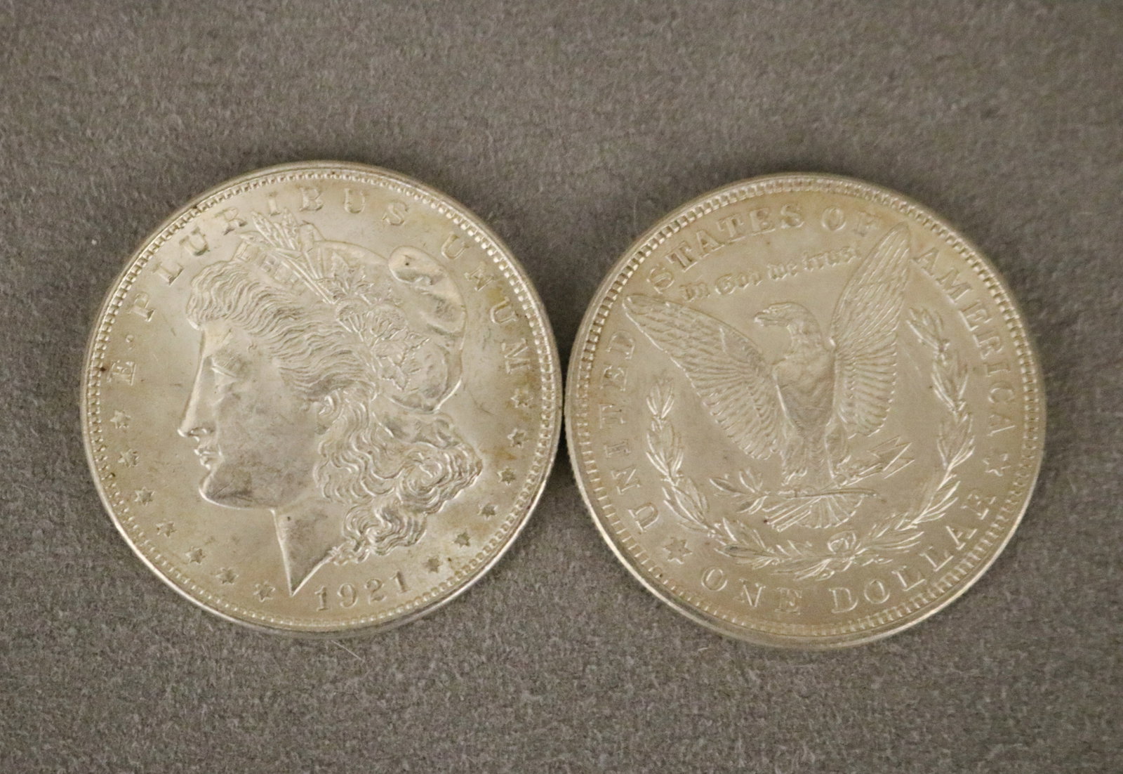 76 U.S. MORGAN SILVER DOLLARS Assorted 19th and 20th century dates. Informally noted as "XF-AU": 76 U.S. MORGAN SILVER DOLLARS Assorted 19th and 20th century dates. Informally noted as "XF-AU" and uncirculated conditions.