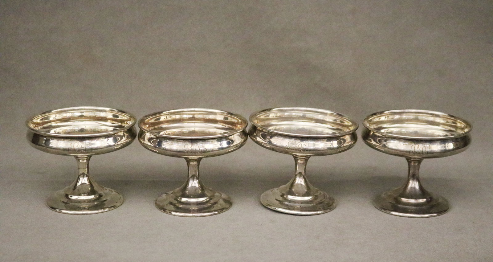SET WHITING CO. STERLING SILVER SHERBET CUPS early 20th century - H: 3 1/8". Wt: 19. 8 troy oz..: SET WHITING CO. STERLING SILVER SHERBET CUPS early 20th century Molded round foot; monogrammed. H: 3 1/8". Wt: 19. 8 troy oz.