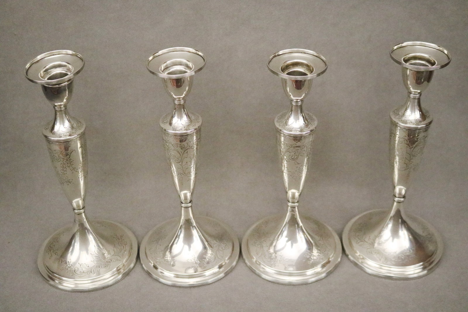 SET OF FOUR S. KIRK & SON CO. WEIGHTED STERLING SILVER CANDLESTICKS - . (1 of 6)