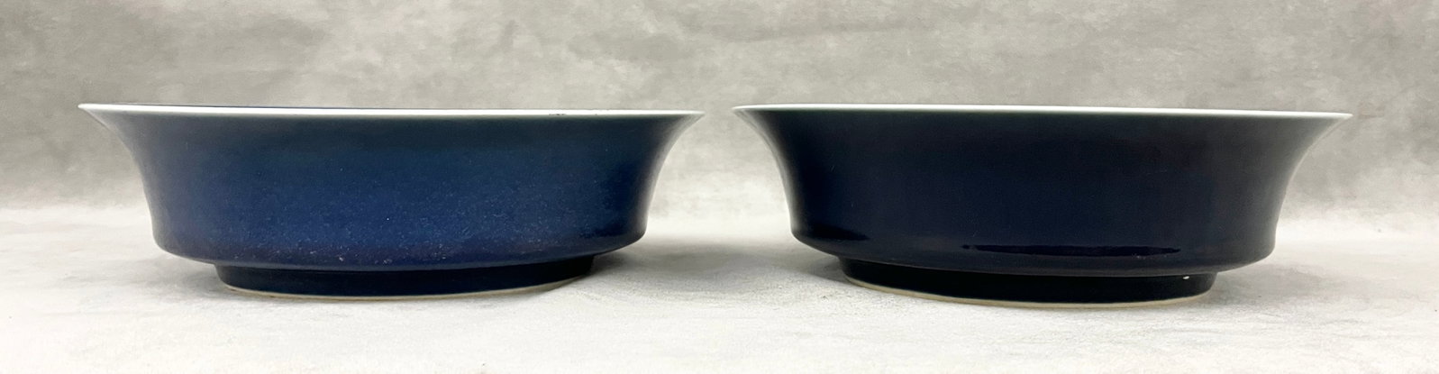 TWO CHINESE SACRIFICIAL COBALT BLUE GLAZED PORCELAIN BOWLS WITH LIGHT BLUE RIMS - D: 8 3/4 in..: TWO CHINESE SACRIFICIAL COBALT BLUE GLAZED PORCELAIN BOWLS WITH LIGHT BLUE RIMS Chinese blue and white double circle mark D: 8 3/4 in.