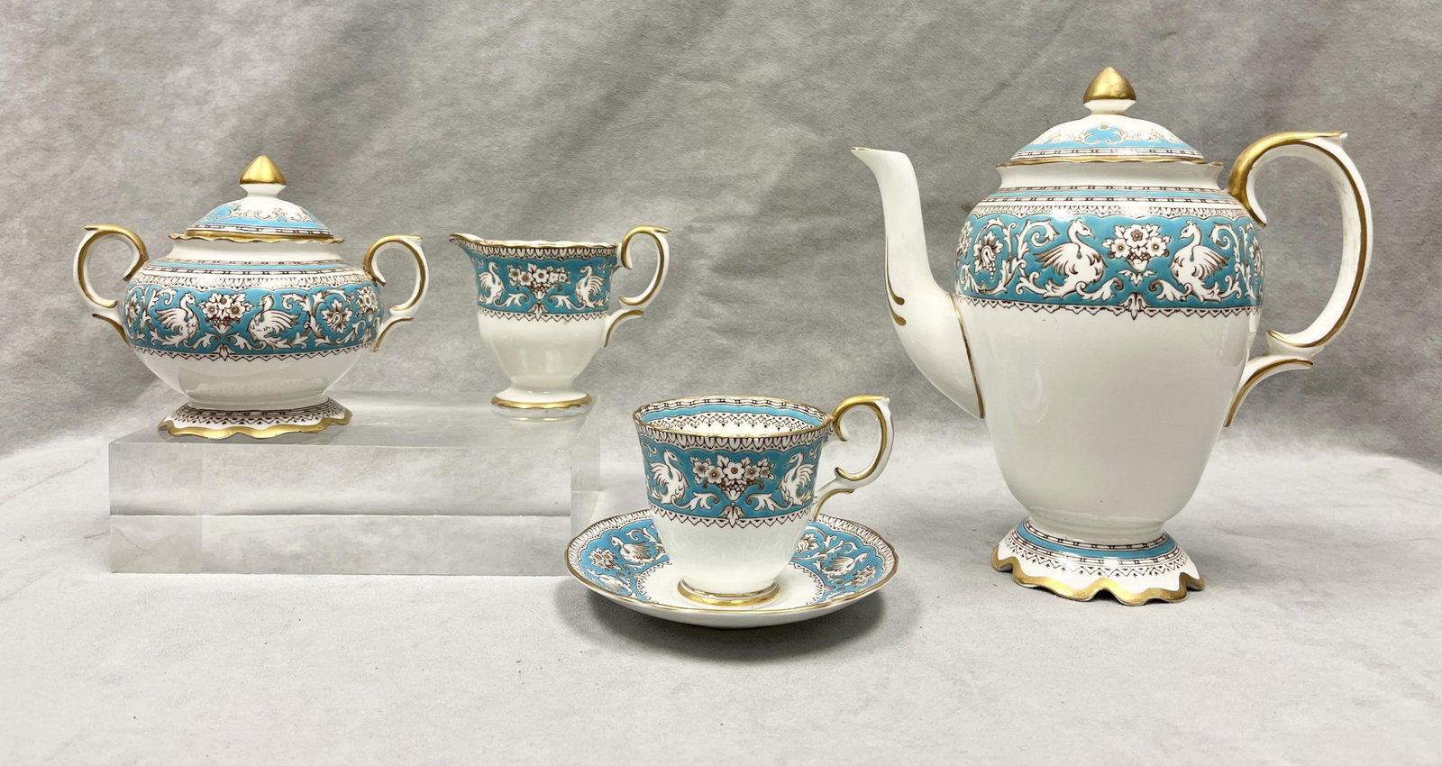 15-PIECE CROWN STAFFORDSHIRE "ELLESMERE" PATTERN BLUE-BANDED PORCELAIN DEMITASSE COFFEE SET - Coffee: 15-PIECE CROWN STAFFORDSHIRE "ELLESMERE" PATTERN BLUE-BANDED PORCELAIN DEMITASSE COFFEE SET Including six cups, and six saucers, coffee pot, creamer, and sugar bowl with lift cover Coffee pot, H: 8 1/