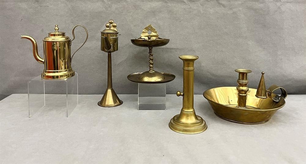 FIVE ANTIQUE BRASS TABLE ARTICLES, circa 1820. Large chamberstick with snuffer, circa 1820, D: 8 1/4: FIVE ANTIQUE BRASS TABLE ARTICLES, circa 1820. Large chamberstick with snuffer, circa 1820, D: 8 1/4 in.; pushup candlestick, H: 6 7/8 in.; teapot, probably Dutch, circa 1850; and two Dutch oil lamps,