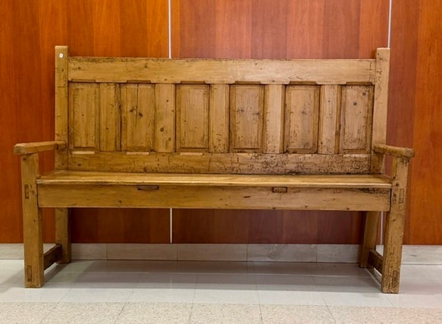 PINE OPEN-ARM THREE-SEAT BENCH 19th century - H: 47 3/4 in.; W: 73 1/2 in.; D: 27 in..: PINE OPEN-ARM THREE-SEAT BENCH 19th century Paneled back; square legs H: 47 3/4 in.; W: 73 1/2 in.; D: 27 in.