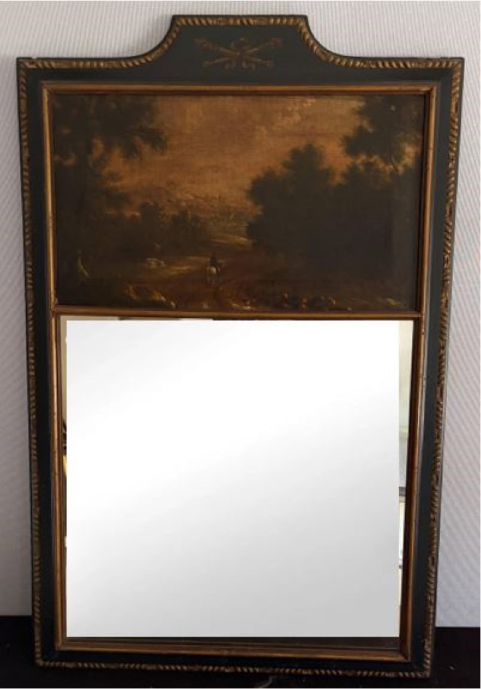 FRENCH EBONIZED AND GILT FRAMED TRUMEAU 19th century - W: 27 1/2 in.; H: 43 1/2 in..: FRENCH EBONIZED AND GILT FRAMED TRUMEAU 19th century Upper panel with oil pastoral scene W: 27 1/2 in.; H: 43 1/2 in.