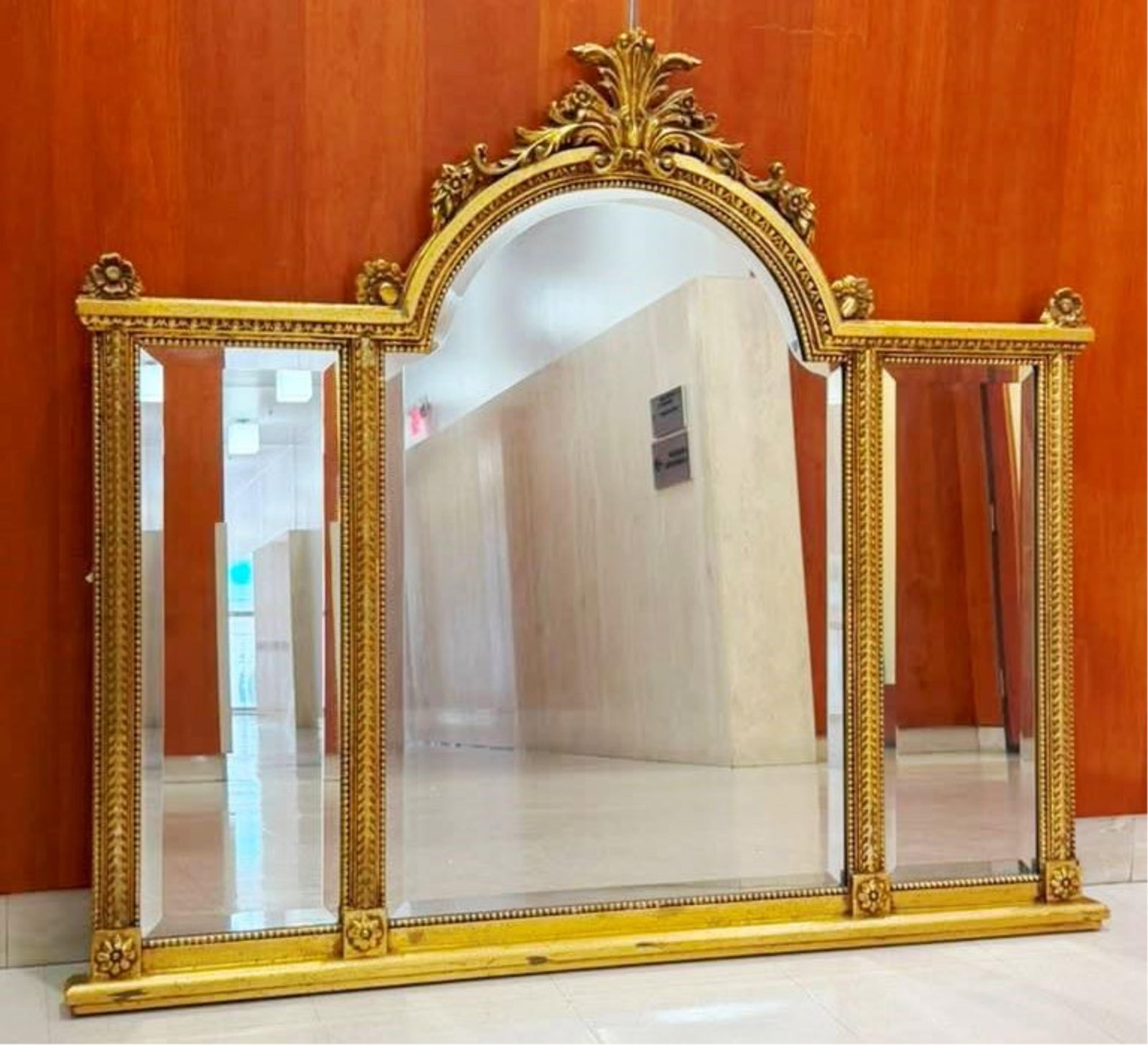 ITALIAN LA BARGE THREE-SECTION OVER-MANTEL GILT-FRAMED WALL MIRROR - H: 47 3/4 in. W: 56 in..: ITALIAN LA BARGE THREE-SECTION OVER-MANTEL GILT-FRAMED WALL MIRROR Domed center section with leaf, floral-and-scroll crest; beveled glass H: 47 3/4 in. W: 56 in.