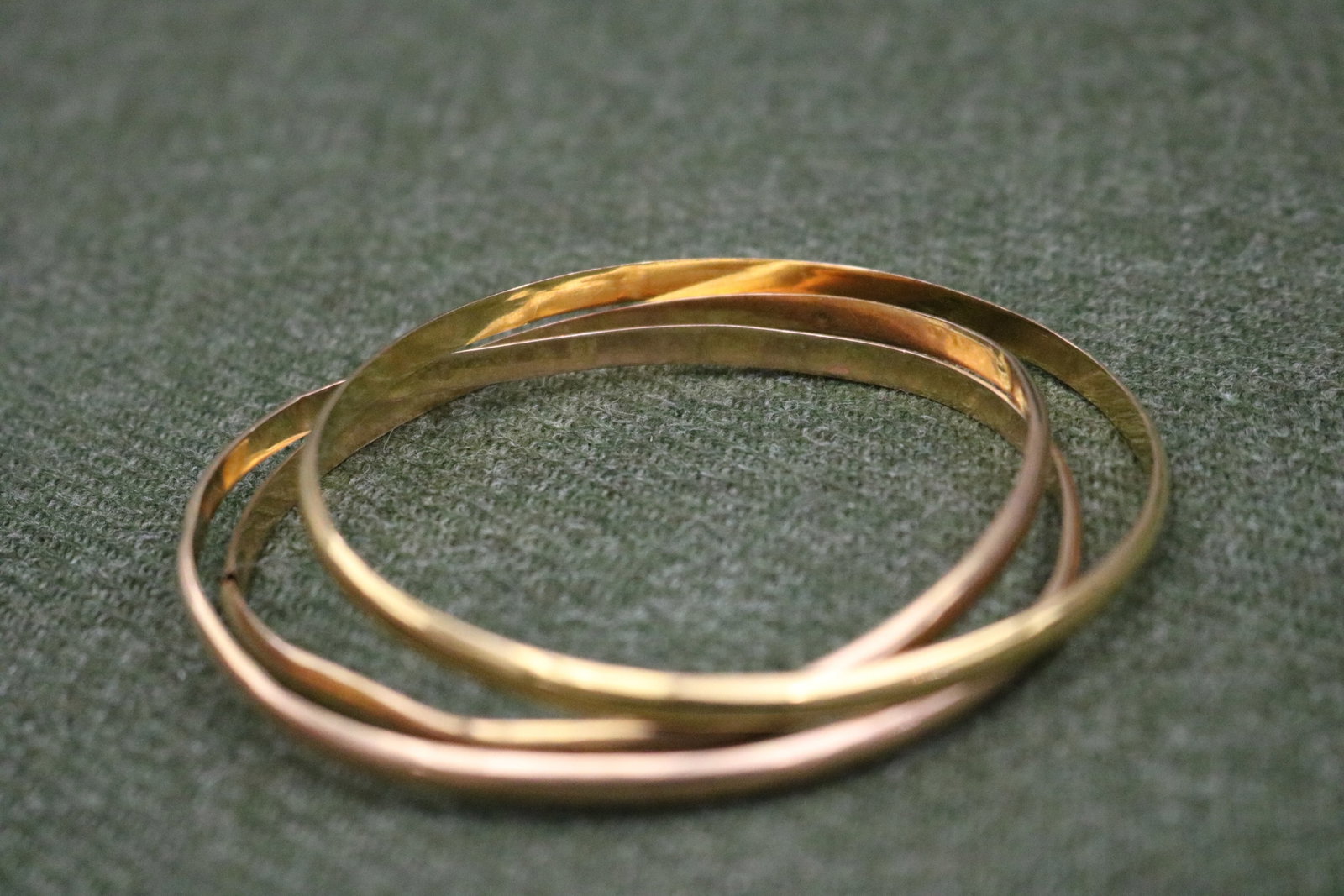 SET OF THREE TURKISH 14K (585) BRIGHT-POLISHED YELLOW GOLD CIRCULAR SLIP-ON BANGLE BRACELETS - D: 2: SET OF THREE TURKISH 14K (585) BRIGHT-POLISHED YELLOW GOLD CIRCULAR SLIP-ON BANGLE BRACELETS D: 2 3/4". W: 1/8". Wt: 7 dwt.
