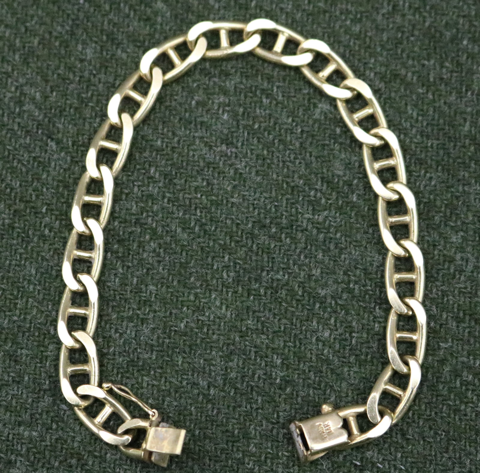 14K BRIGHT-POLISHED YELLOW GOLD FLEXIBLE-LINK BRACELET - L: 7 3/8". W: 1/4". Wt: 10 dwt.. (1 of 11)