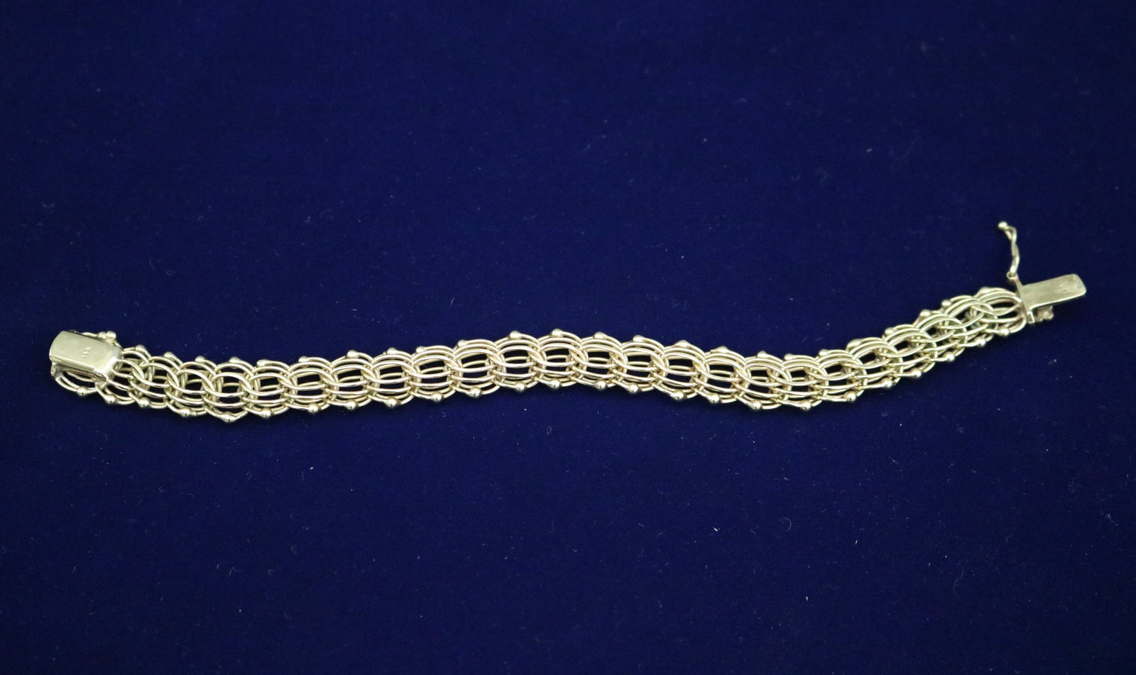 14K BRIGHT-POLISHED YELLOW GOLD TRIPLE-OVAL LINK FLEXIBLE STRAP BRACELET - L: 8". W: 1/2". Wt: 18: 14K BRIGHT-POLISHED YELLOW GOLD TRIPLE-OVAL LINK FLEXIBLE STRAP BRACELET L: 8". W: 1/2". Wt: 18 dwt.