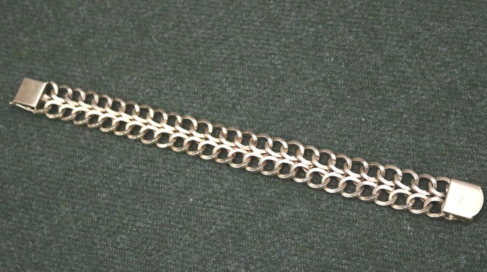 14K TEXTURED YELLOW GOLD OPENWORK, FLEXIBLE-LINK STRAP BRACELET - L: 7 3/4". W: 5/8". Wt: 1 oz. 12 (1 of 11)
