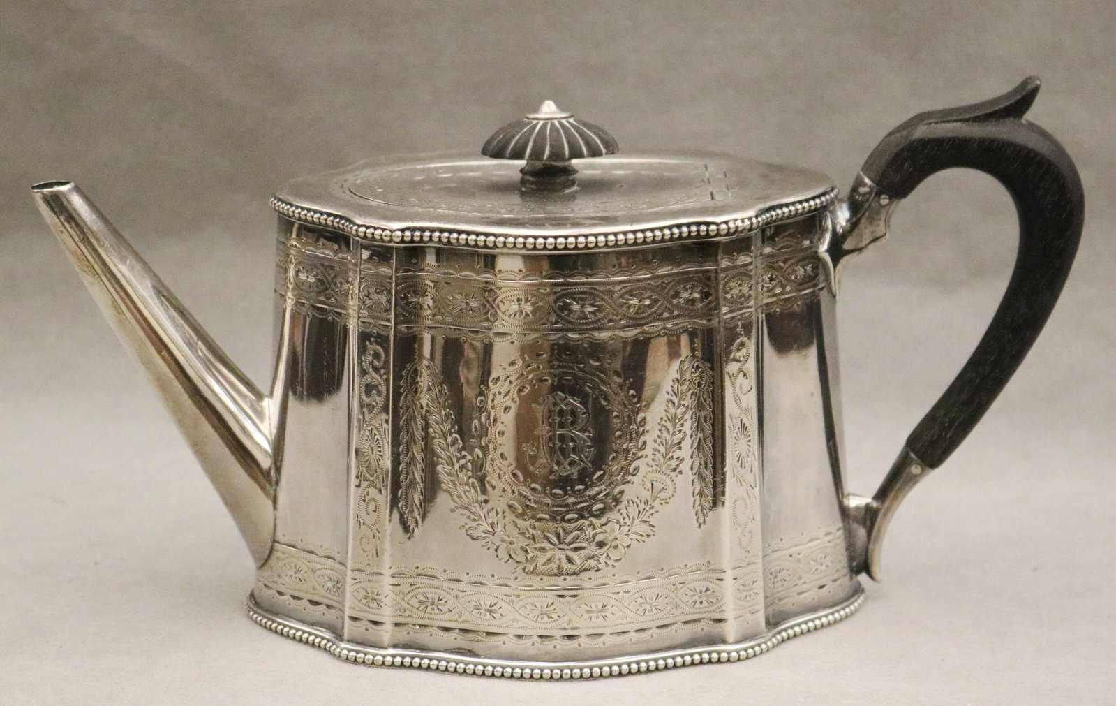 ENGLISH VICTORIAN SILVER TEAPOT Made London, 1869-70; maker's punchmark "WH" - H: 5 1/2 in. Gross (1 of 5)