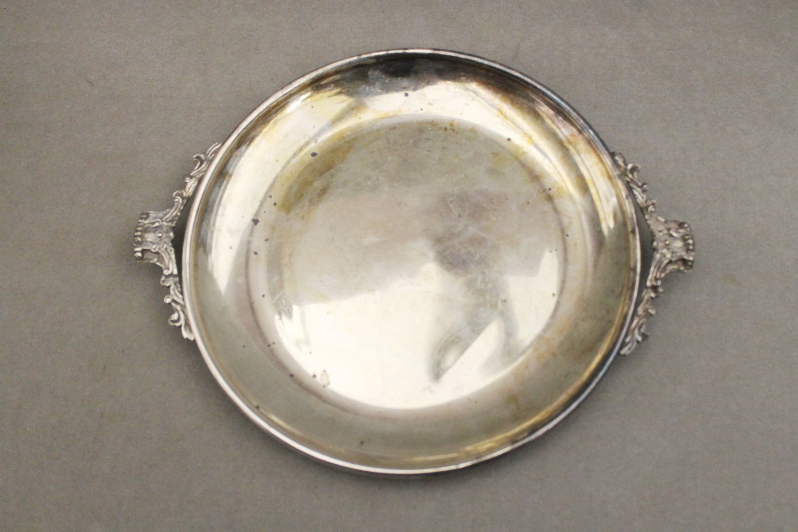 THREE STERLING SILVER TABLE ITEMS - Wt. 37 troy oz.. - 7