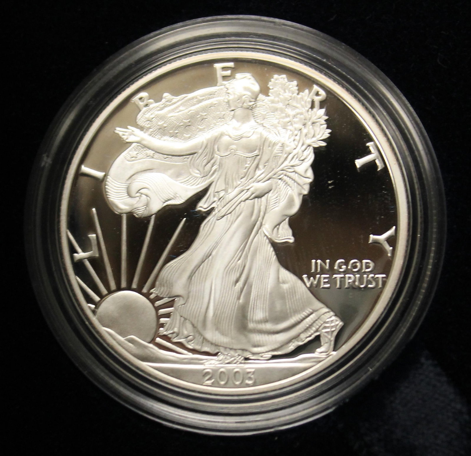 18 U.S. MINT AMERICAN EAGLE/LIBERTY SILVER PROOF ONE-DOLLAR COINS - .: 18 U.S. MINT AMERICAN EAGLE/LIBERTY SILVER PROOF ONE-DOLLAR COINS Including two 1986, three 1991, one 1992, one 1997, two 1989, two 2000, two 2001, two 2002, one 2003, and two 2004.