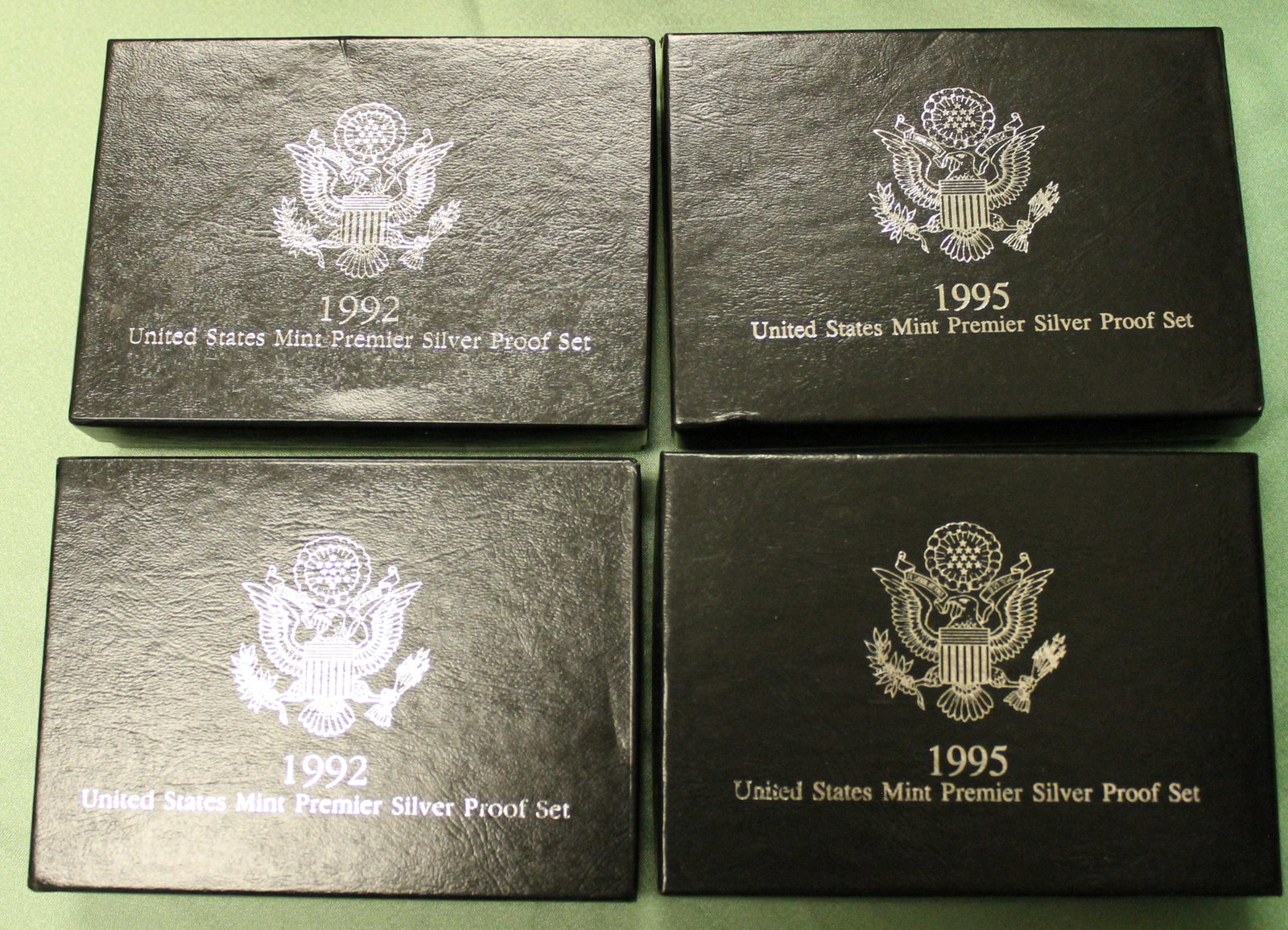 FOUR U.S. MINT FIVE-COIN SILVER PROOF SETS - . - 2