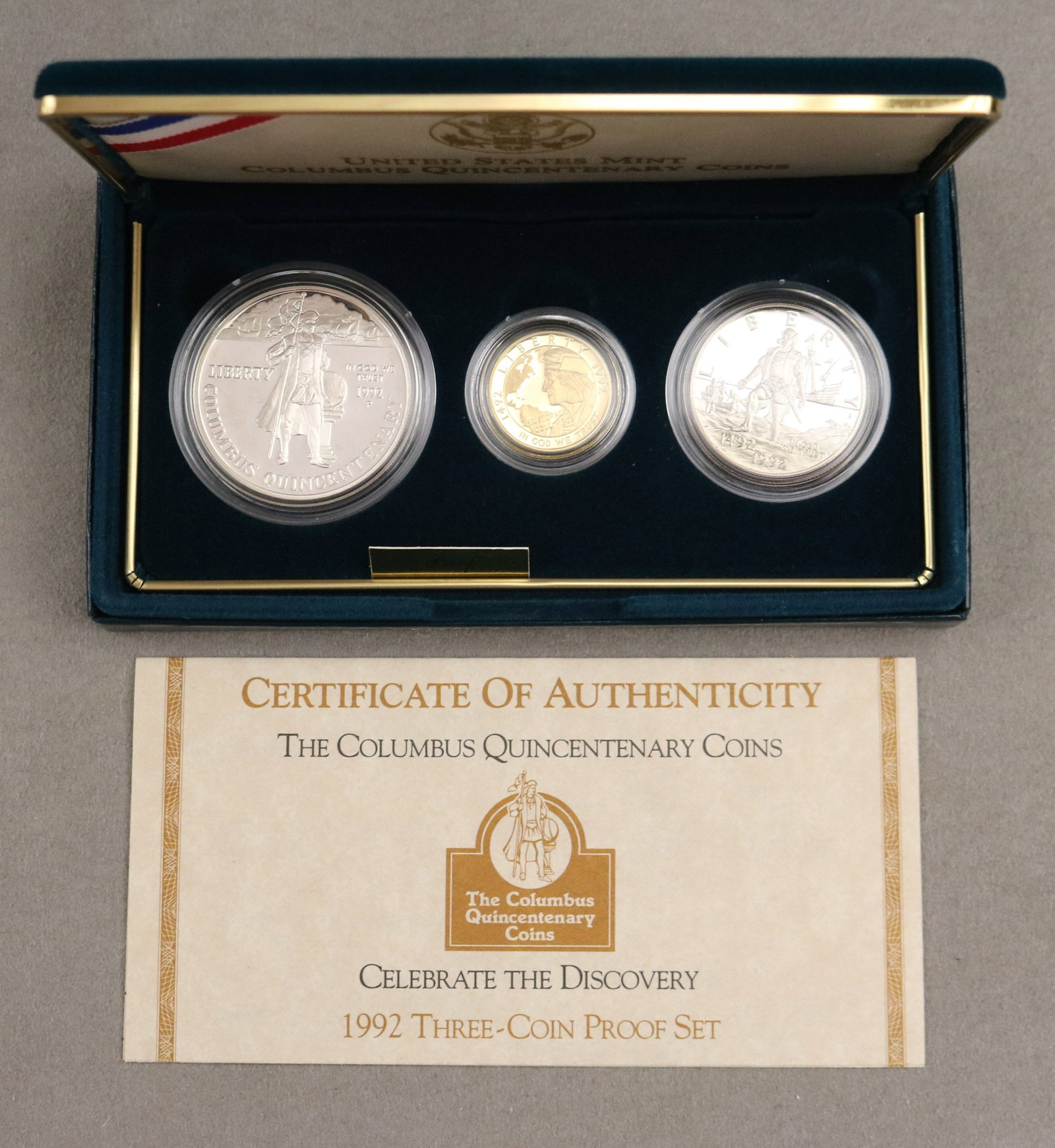 U.S. MINT COLUMBUS QUINCENTENARY COMMEMORATIVE SILVER AND GOLD PROOF THREE-COIN SET, 1992 - .: U.S. MINT COLUMBUS QUINCENTENARY COMMEMORATIVE SILVER AND GOLD PROOF THREE-COIN SET, 1992 Including silver dollar, silver half-dollar, and gold five-dollar coins