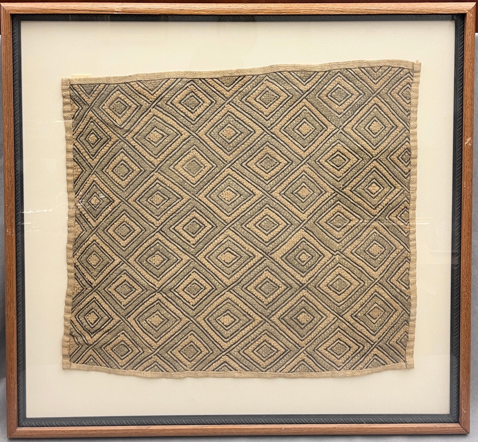 CONGOLESE KUBA CUT-PILE PLUSH RAFFIA TEXTILE (KASAI VELVET) SHOOWA / BUSHONG PEOPLES Hand-spun: CONGOLESE KUBA CUT-PILE PLUSH RAFFIA TEXTILE (KASAI VELVET) SHOOWA / BUSHONG PEOPLES Hand-spun raffia fiber, natural dyes Kuba raffia textile panel featuring a repeating, interlocking diamond lattice 