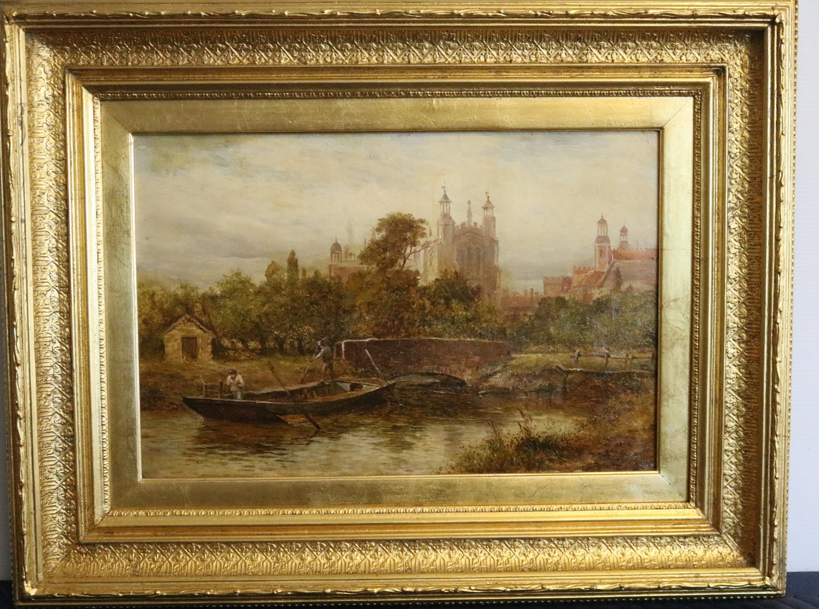JOHN WHIPPLE (British, active 1873 to 1896). A River Landscape with Boatmen and Distant Towers, Oil: JOHN WHIPPLE British, active 1873 to 1896 A River Landscape with Boatmen and Distant Towers Oil on canvas English oil painting depicting a punter navigating a rowboat along a tranquil river beside a s