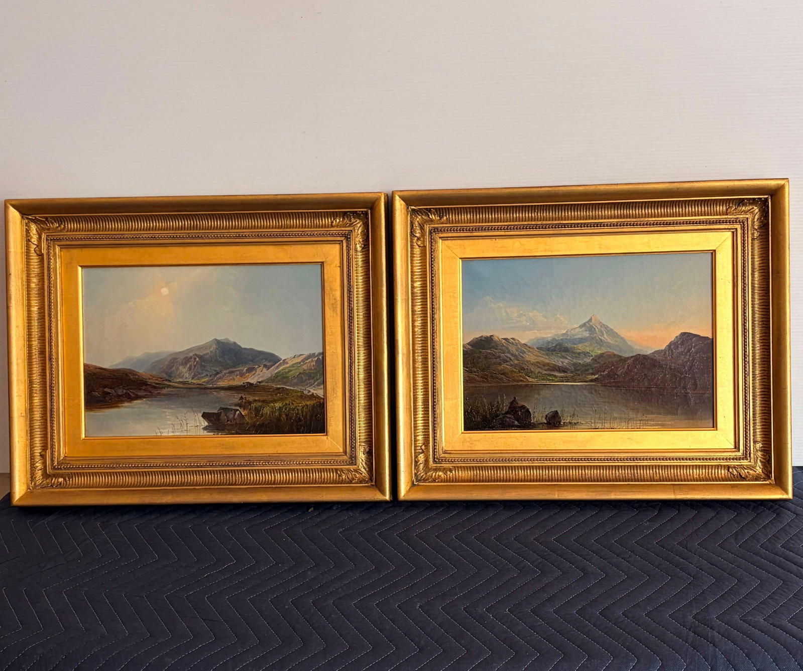 GEORGE AUGUSTUS WILLIAMS (British, 1814 - 1901). Lake and Mountain Views towards Snowdon (a pair),: GEORGE AUGUSTUS WILLIAMS British, 1814 - 1901 Lake and Mountain Views towards Snowdon (a pair) Oil on canvas Pair of artworks, one signed, each depicting tranquil Welsh lakes with reed-lined foregroun
