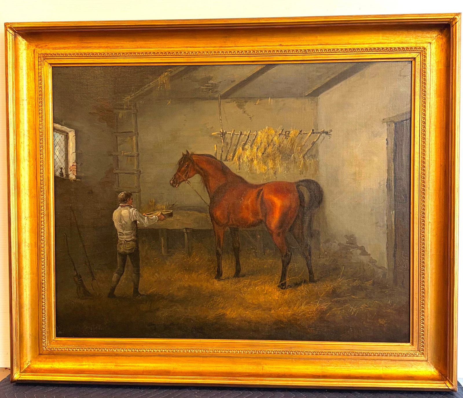 JOHN FRANCIS SARTORIUS (English, 1775-1831). Horse in a Stable Being Fed by a Groom, Oil on canvas,: JOHN FRANCIS SARTORIUS English, 1775-1831 Horse in a Stable Being Fed by a Groom Oil on canvas Signed artwork depicting a bay horse tethered in a rustic stable interior as a groom in period dress exte