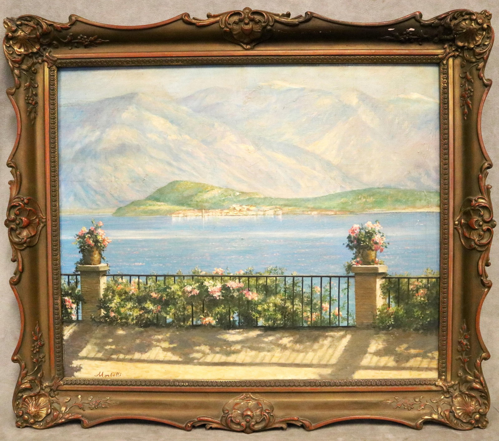 ANGELO MORBELLI (AFTER) (Italian, 19th / 20th century). View of the Isola Bella on Lake Maggiore,: ANGELO MORBELLI (AFTER) Italian, 19th / 20th century View of the Isola Bella on Lake Maggiore Oil on board Signed "MORBELLI" lower left. Framed. 19 x 23 inches; frame: 25 x 29 inches