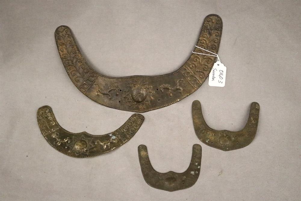 INDONESIAN SUMBANESE MAMULI PENDANTS. Lot of four patinated sumbanese mamuli pendants, which are (1 of 20)