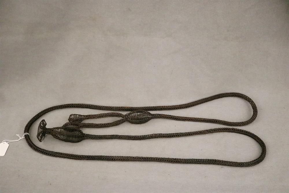 INDONESIAN SUMBESE TAU HUMBA PEOPLE BELT. Patinated hand assembled metal belt used by the Sumba (or: INDONESIAN SUMBESE TAU HUMBA PEOPLE BELT. Patinated hand assembled metal belt used by the Sumba (or Sumbese) people, an ethnic group inhabiting Sumba Island in Indonesia. - Length: 49 inches (Approxim