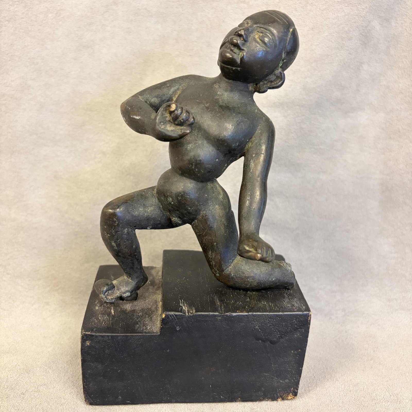 BRONZE FIGURE OF BALAKRISHNA, THE INFANT KRISHNA, BAL GOPALA 19th century or earlier - Height : 6.25: BRONZE FIGURE OF BALAKRISHNA, THE INFANT KRISHNA, BAL GOPALA 19th century or earlier A patinated bronze South Indian figure of Balakrishna, the infant Krishna, shown crawling on a tiered rectangular p