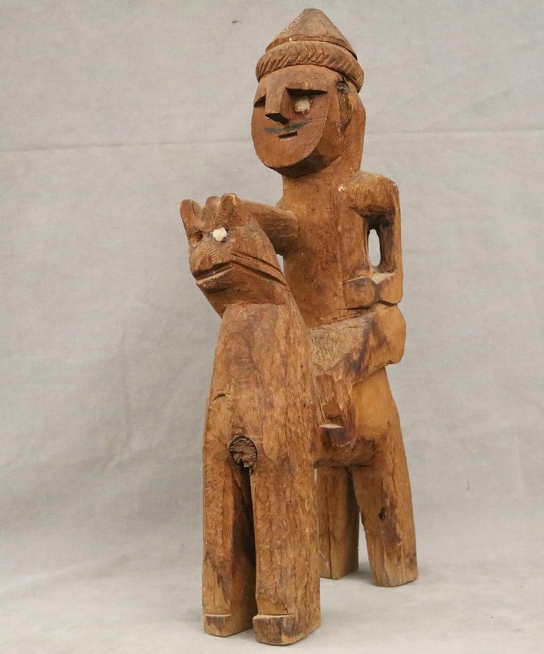 PAKISTANI KALASH GANDAU WOODEN FUNERARY FIGURE OF A MALE RIDING A HORSE, late 1960s. - Height: 16: PAKISTANI KALASH GANDAU WOODEN FUNERARY FIGURE OF A MALE RIDING A HORSE, late 1960s. Patinated carved wooden figure acquired in the late-1960s. "Gandaus" are traditionally carved by the Kalash people 