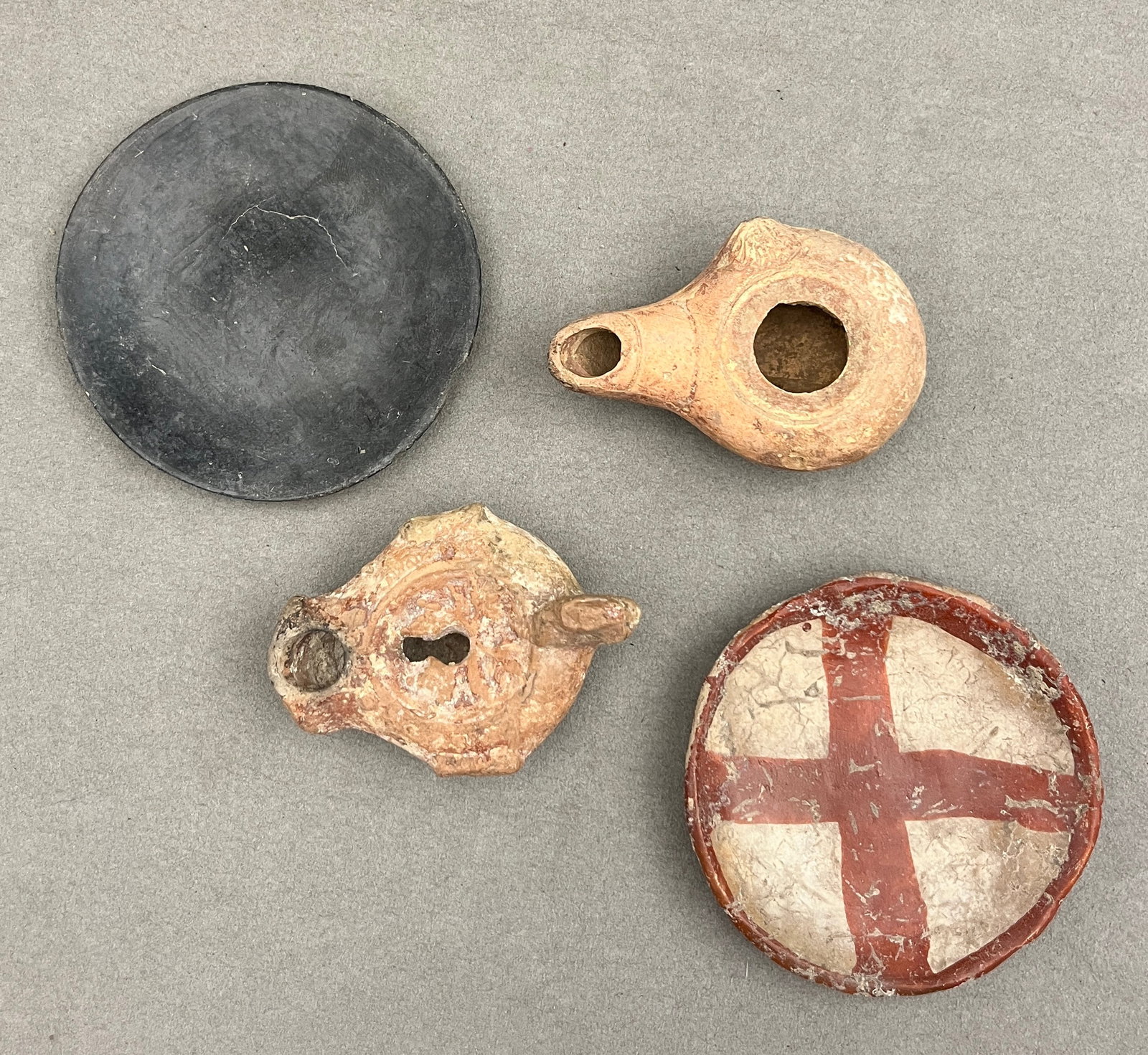 GROUP OF TWO ANCIENT POTTERY OIL LAMPS AND TWO DISHES - Discs are approx. 3 x 3 inches. (1 of 20)
