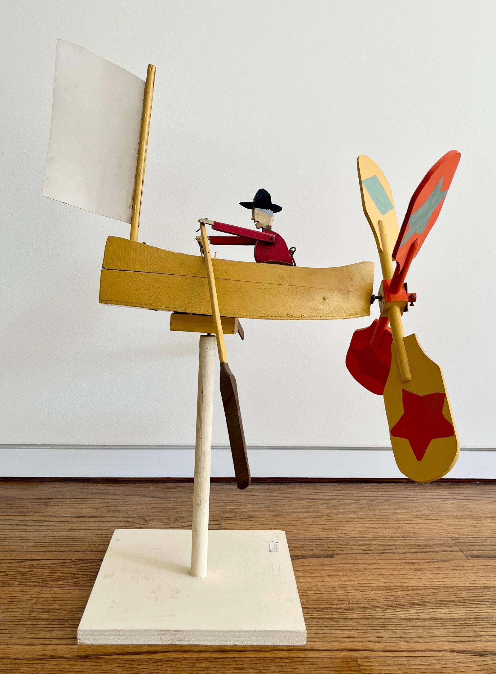 HAROLD "DICK" TUTTY (Canadian (Glace Bay, Nova Scotia), 1919 - 1997). Folk Art Painted Wood Boating: HAROLD "DICK" TUTTY Canadian (Glace Bay, Nova Scotia), 1919 - 1997 Folk Art Painted Wood Boating Whirligig with Propeller Mechanism, 1988 Mixed media Signed and dated at base. Handcrafted painted wood