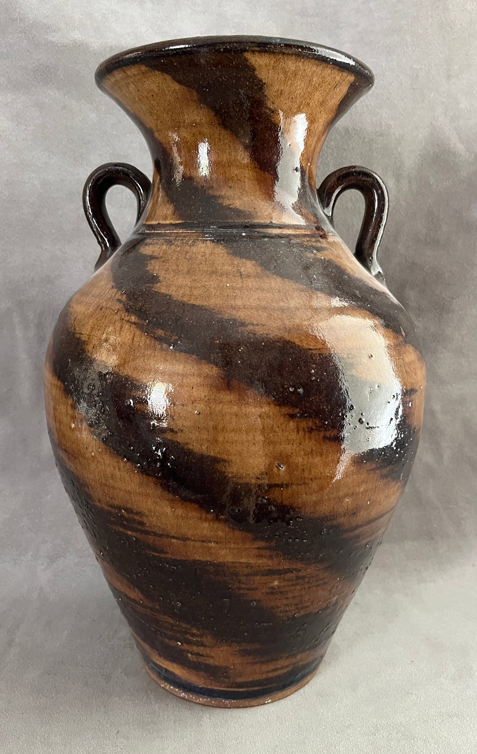 KIM ELLINGTON (American, born 1954). GLAZED STONEWARE TWIN-HANDLED VASE, TIGER-STRIPE DRIP GLAZE, (1 of 6)