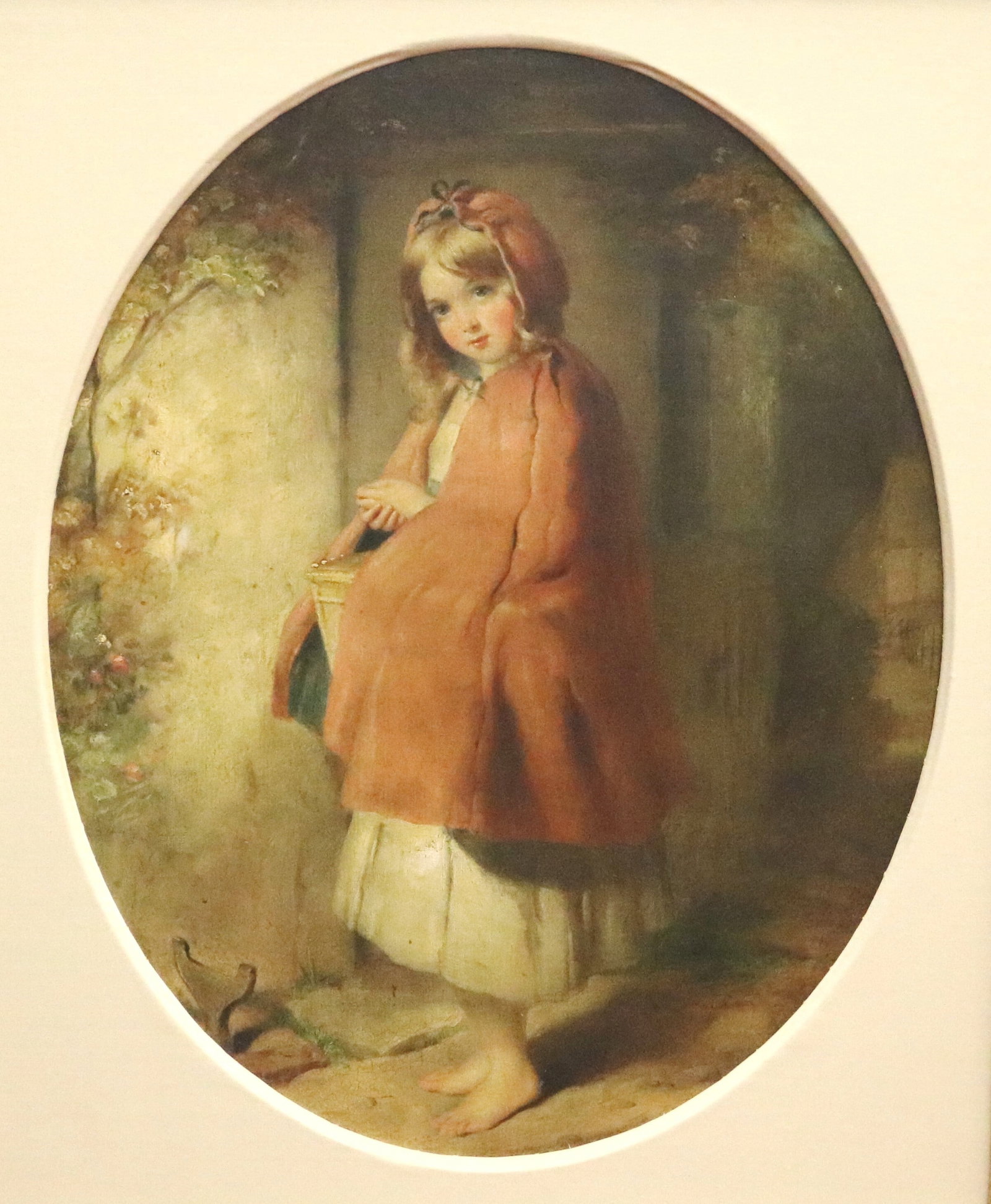 AMERICAN SCHOOL (19th century). Little Red Riding Hood with Basket, Oil on canvas, 26.5 x 21 inches;: AMERICAN SCHOOL 19th century Little Red Riding Hood with Basket Oil on canvas No visible signature. Presented within an oval format, this narrative scene depicts a young barefoot girl wearing a hooded