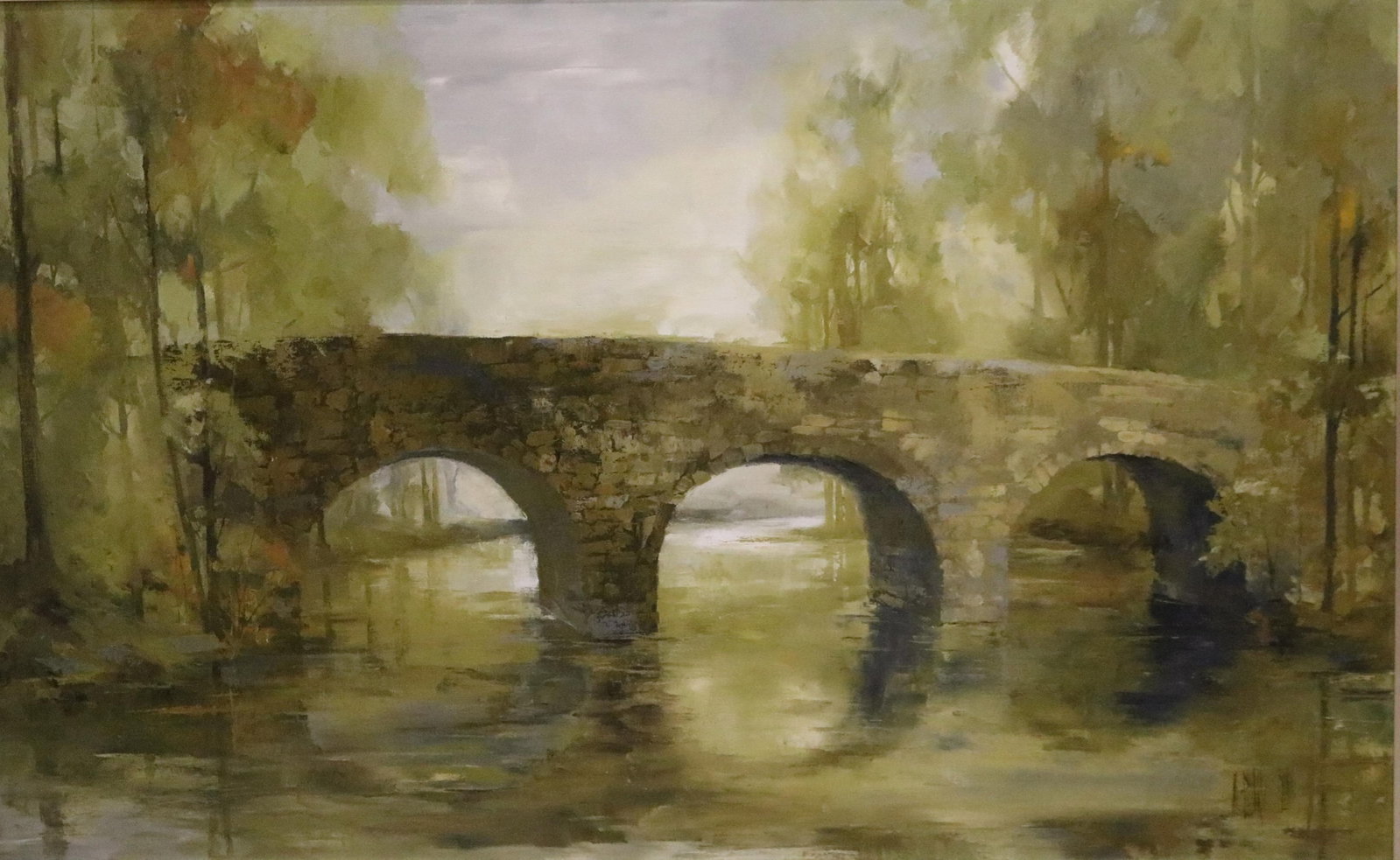 M. BEVERLY BUNN (American, 1928 - 2003). The Old Stone Bridge at Dusk, Oil on canvas, 31 x 50 inches: M. BEVERLY BUNN American, 1928 - 2003 The Old Stone Bridge at Dusk Oil on canvas Signed lower right. Landscape painting that portrays a weathered, multi-arched stone bridge spanning a tranquil river, 