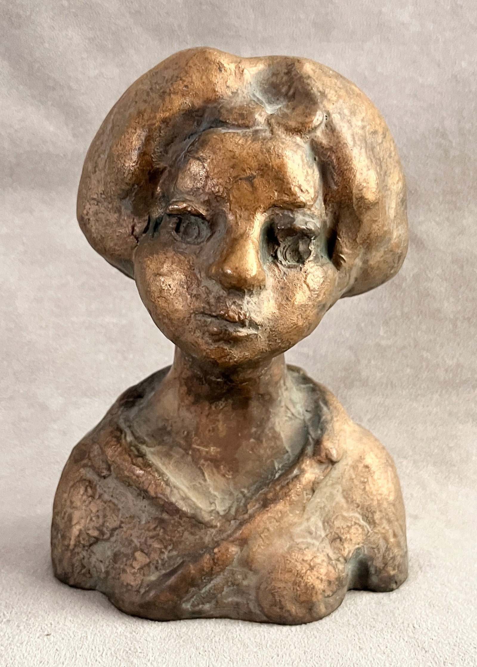 REUBEN KRAMER (American, 1909-1999). Bust of Maiden ("Miss Blueberry Pie"), 1963, Cast Bronze,: REUBEN KRAMER American, 1909-1999 Bust of Maiden ("Miss Blueberry Pie"), 1963 Cast Bronze Bust that depicts a young female figure (sometimes titled "Miss Blueberry Pie") rendered with rounded features