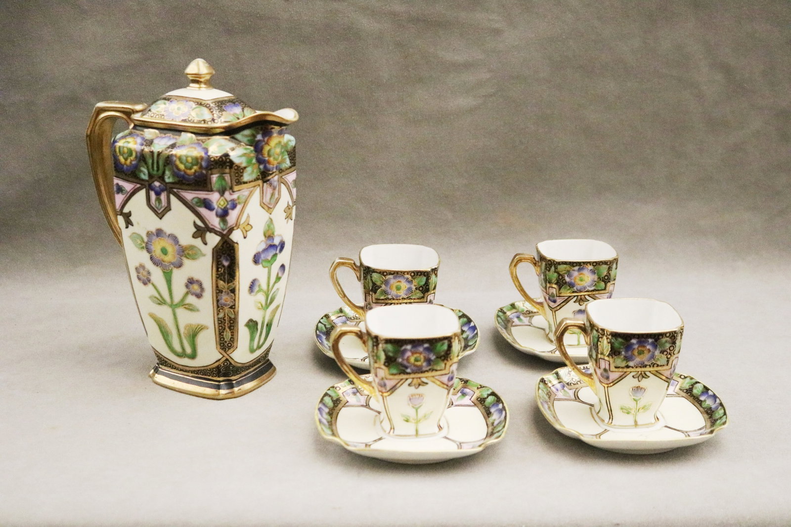 NINE-PIECE NORITAKE FLORAL POLYCHROME PAINTED CHINA CHOCOLATE SET early 20th century - H: 9 in.. (1 of 7)