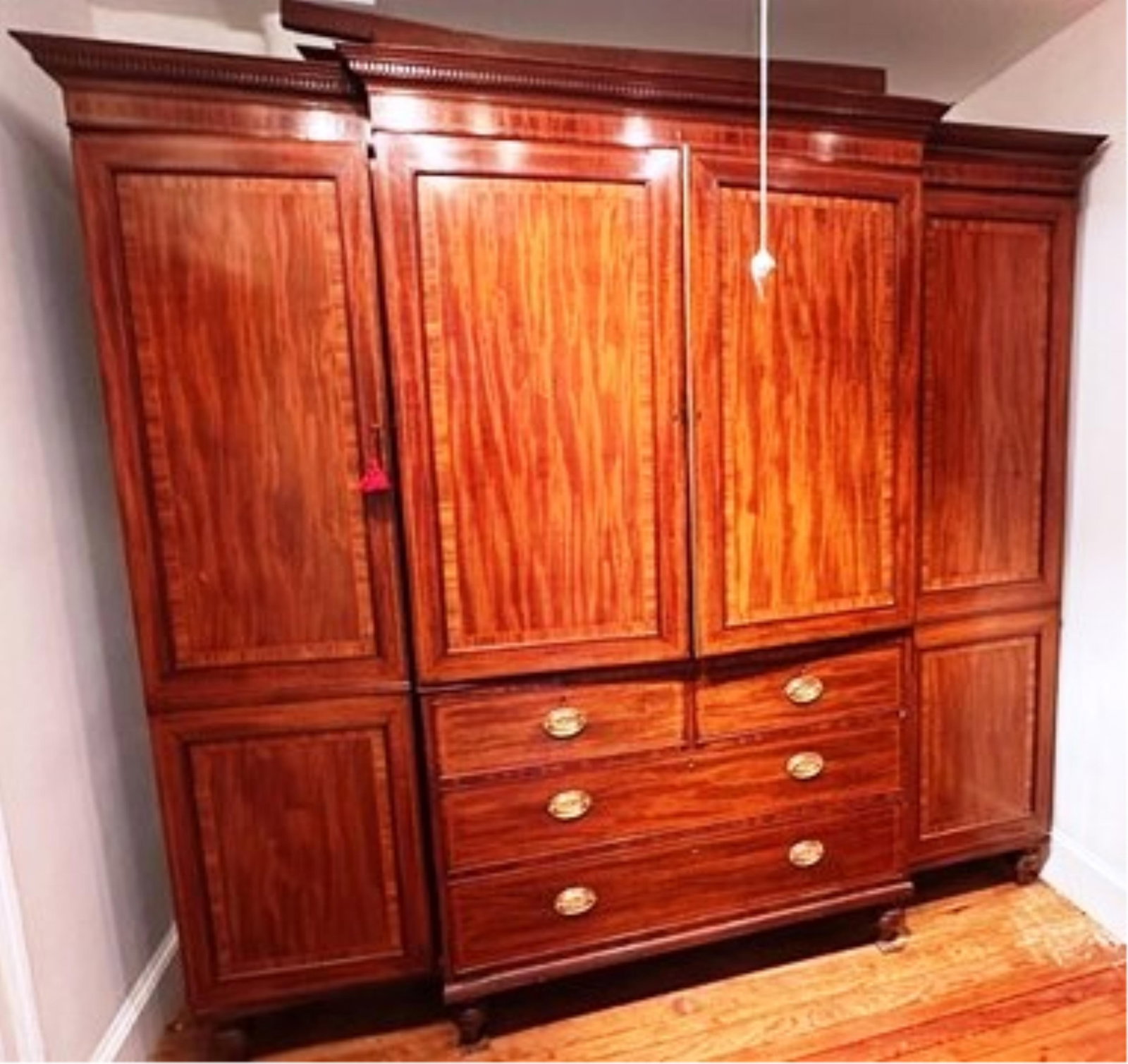 GEORGE III STYLE INLAID MAHOGANY LINEN PRESS WARDROBE CABINET early 20th century, Edwardian - H: 84: GEORGE III STYLE INLAID MAHOGANY LINEN PRESS WARDROBE CABINET early 20th century, Edwardian Four sections. Linen press with pair paneled cabinet doors opening to three shirt shelves, over two aligned 