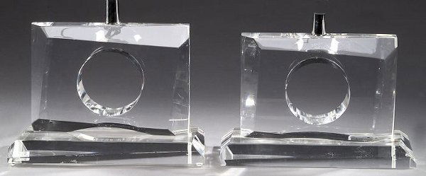 A PAIR OF CONTEMPORARY LUCITE SCULPTURES: A PAIR OF CONTEMPORARY LUCITE SCULPTURES, signed 'Van Teal'. Each of retangular form, with pierced circular center; mounted as lamps - 9 x 13 1/4 in.