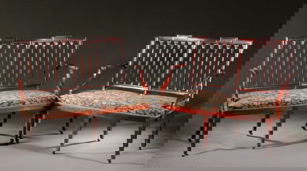 PAIR HEPPLEWHITE STYLE MAHOGANY SETTEES. early 20: PAIR HEPPLEWHITE STYLE MAHOGANY SETTEES. early 20th century. Rectangular fluted tablet crest; molded-edge frame enclosing gothic-arcaded spindle back; shaped arm rests; padded and upholstered tight se