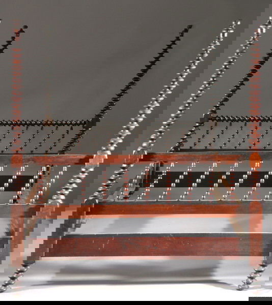 AMERICAN MAHOGANY SPOOL-TURNED FOUR-POSTER BED, 19: AMERICAN MAHOGANY SPOOL-TURNED FOUR-POSTER BED, 19th century. Graduating spool-turned posts with urn finials; head and foot board gallery with ten upright turned spindles; spool feet. - 59 3/4 in. x 5