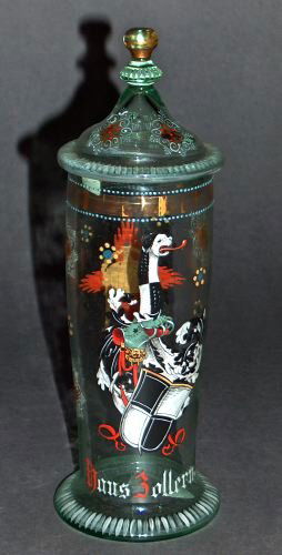 A GERMAN GLASS AND ENAMEL HUMPEN WITH LID, 19th cen: A GERMAN GLASS AND ENAMEL HUMPEN WITH LID, 19th century. Depicting the black and silver Zollern family shield along with an animal, with 'Haus Zollern' underneath, on the reverse side a jewelled crown