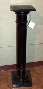 AN ENGLISH EBONIZED WOOD PEDESTAL, late 19th centu: AN ENGLISH EBONIZED WOOD PEDESTAL, late 19th century. The square shaped plank resting above a ring turned fluted column, on a square shaped plinth block - 42 in. x 10 1/4 in. x 10 1/4 in.