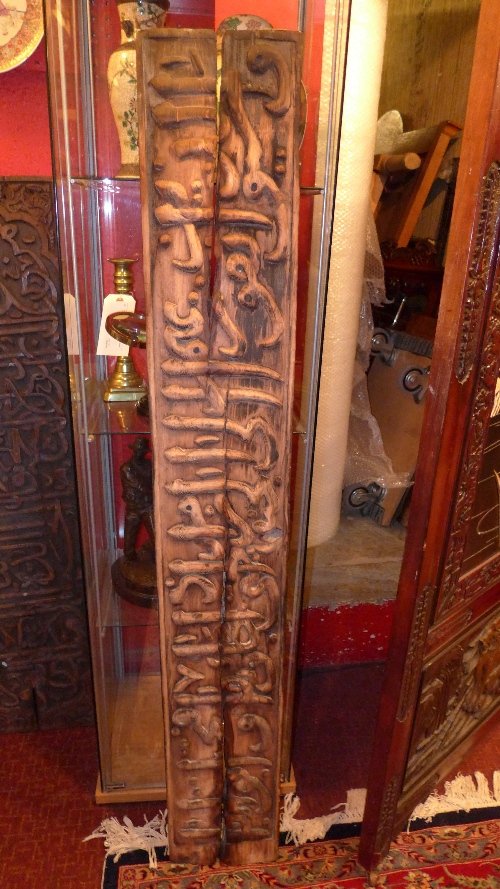A C15th/C16th Mamluk carved wooden panel w Qur'an kufic: A C15th/C16th Mamluk carved wooden panel with kufic calligraphic inscription of quotation from the Qur`an. Height 140 cm x Width 21 cm.