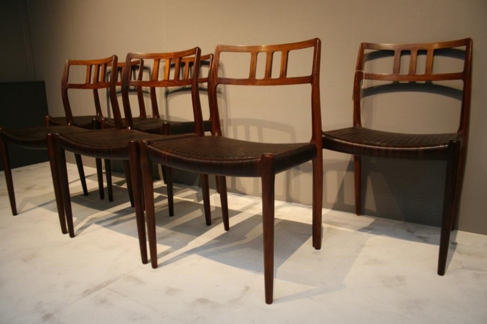A set of six Danish rosewood dining chairs (model 79) w: A set of six Danish rosewood dining chairs (model 79) with original brown leather cord woven seats designed by Niels Otto Moller in 1966 and made labeled during 1966-69 by J L Moller